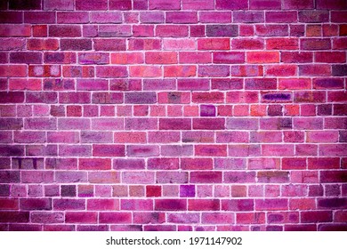 Close-up of brick wall with purple, pink, fuchsia, ultra violet, black color brick background, artiscic backdrop - Shutterstock ID 1971147902