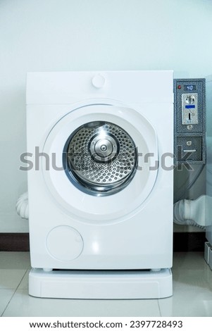 Close-Up, Bright and clean Washing machine at hotel. laundromat businessconcept.