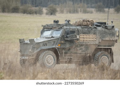 close-up of a British army Foxhound 4x4-wheel drive protected patrol vehicle on a military exercise, Wiltshire UK