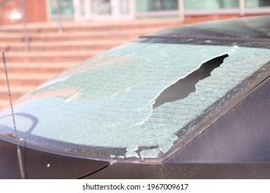 Closeup Of Broken Rear Window Of Car