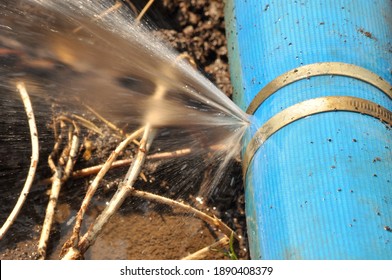 Close-up Of Broken Water Pipe Sprinkler System Background, Water Spray.