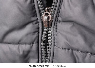 Close-up Of A Broken Zipper On A Jacket.