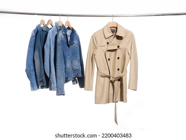 Closeup Brown Coat With  Jeans Jacket On Hanger