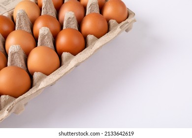 Close-up Of Brown Eggs In Egg Carton On Table With Blank Space. Unaltered, Copy Space, Healthy Food, Raw Food, Organic, Protein, Fresh And Still Life.