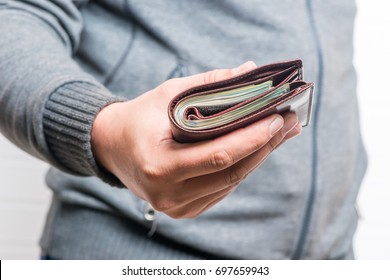 Close-up Brown Leather Wallet Stuffed With Money