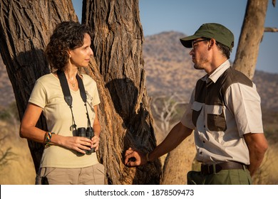 Close-up Of Brunette Talking With Safari Guide