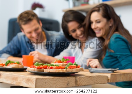 Similar – Mediterranean lunch or dinner with roasted dorado fishes, homemade focaccia bread , olive oil and olives served on rustic table with tableware and kitchen utensils, top view.