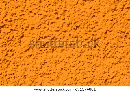 Closeup of a building orange wall texture