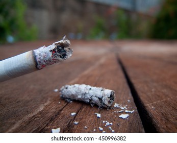 cigarette ashes on the ground