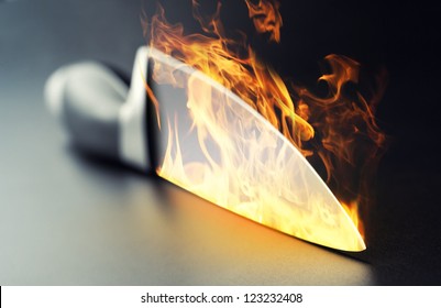 Closeup of burning professional kitchen knife