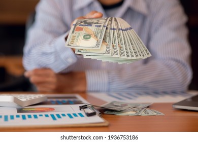 Close-up Business Hands money pocket and counting money American dollars , Income and Business concept.	
