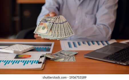 Close-up Business Hands money pocket and counting money American dollars , Income and Business concept.	