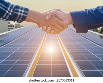 Close-up of business people handshaking on background of solar panel, Close up people hands shake business partnership success, Shake hand concept - Shutterstock ID 2170363311