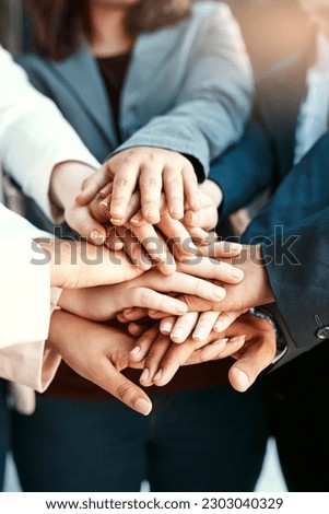 Closeup, business and team with hands, stack and collaboration with teamwork, brainstorming and planning. Zoom, group and staff with partnership, fingers and motivation with solidarity and support