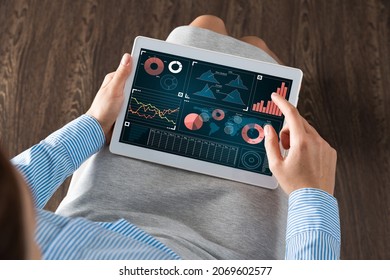 close-up business woman with computer tablet on lap - Shutterstock ID 2069602577