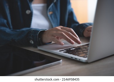 Closeup Business Woman Working, Hands Typing On Laptop Computer On Wooden Desk At Office. Female Student Studying Online Class Via Laptop, E-learning, Telecommuting Concept