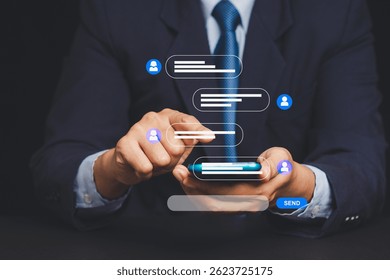 Close-up of businessman texting with chat bubbles on screen, ideal for illustrating digital interaction, real-time messaging, social media communication, and remote collaboration.