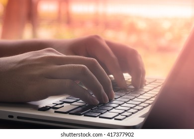 Closeup of businessman typing on laptop computer - Shutterstock ID 417377902