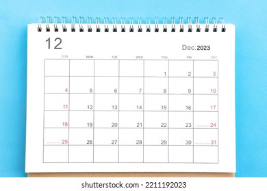 close-up of calendar december of november 2023 top view on a blue background - Powered by Shutterstock