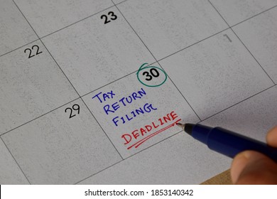 Close-up of calendar page with date reminder. Concept of income tax return (ITR) submission, selective focus. - Shutterstock ID 1853140342