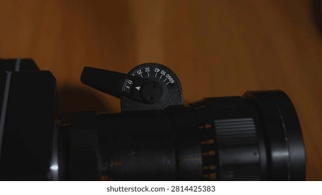 Close-up of a camera lens focus ring