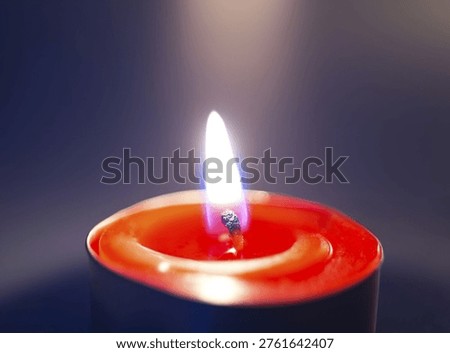 Close-up of a candle burning.