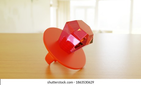 A Closeup Of A Candy Ring Resting On Top Of A Wooden Table.