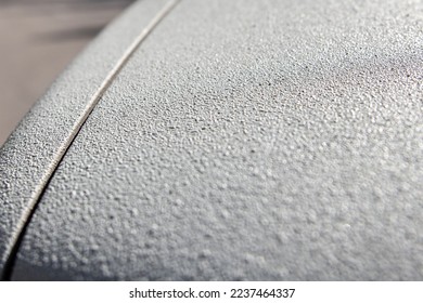 Close-up of a car body coated with the highest strength two-component polymer paint used to protect the bodies of pickups, trucks, trailers.