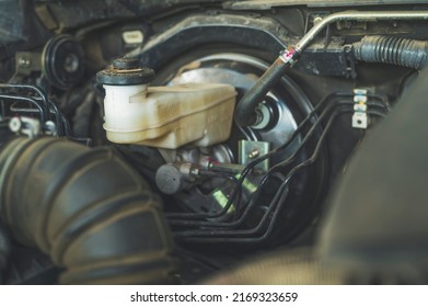 Close-up Of Car Brake Fluid Reservoir.