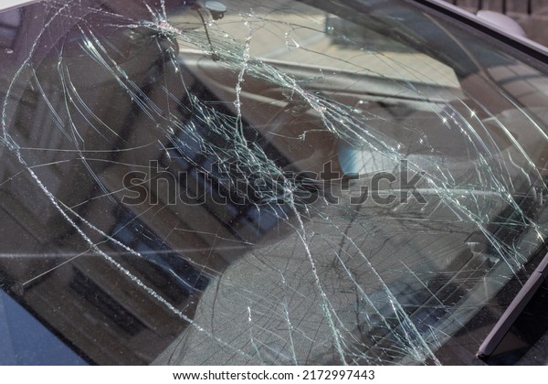 Closeup of car with\
broken windshield, Terrible dangerous car after a fatal accident.\
Broken windshield.\
Ukraine.