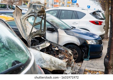 Closeup of the car burnt down on the city car park - Shutterstock ID 1631971972