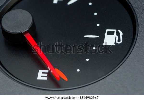 Close-up car dash board petrol\
meter, fuel gauge, with over full gasoline in car. Clip. Gasoline\
sensor