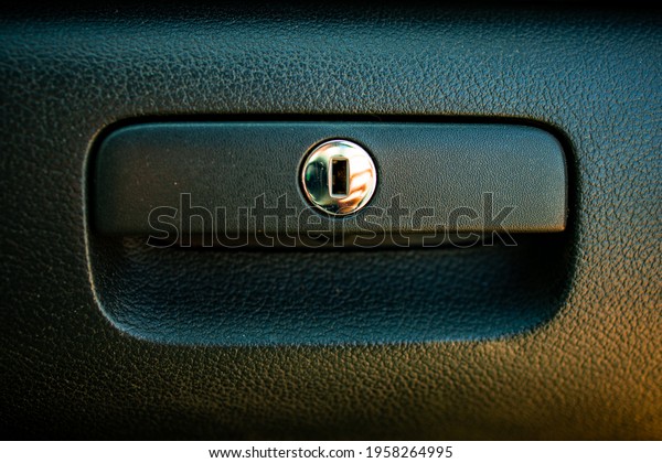 Close-up of\
car drawer handle. Interior parts of\
cars.