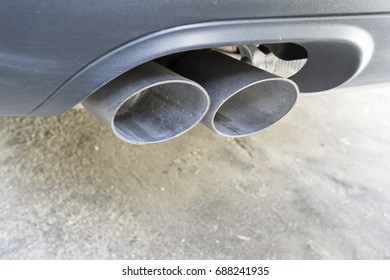 Closeup Of A Car Exhaust. Double Pipe From A Diesel Engine