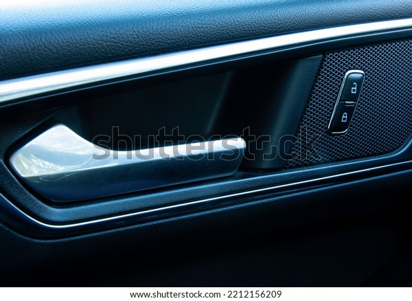 close-up of car handle and\
door lock
