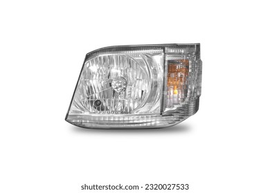 Closeup of car headlight isolated on white background, Clipping path included.