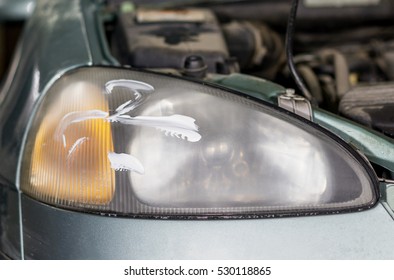 Closeup Car Lamp Or Front Headlight Polishing, Renewed Headlamp