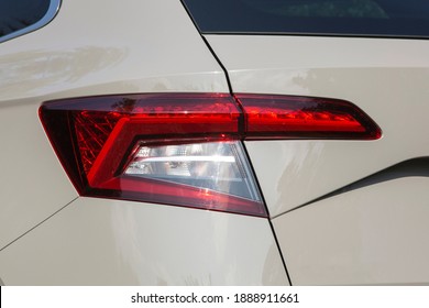 Close-up  car rear tail-lamp with a tail light stop signal.
