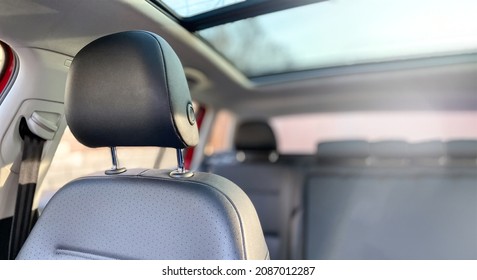 Close-up of a car seat headrest. Photography of the car interior