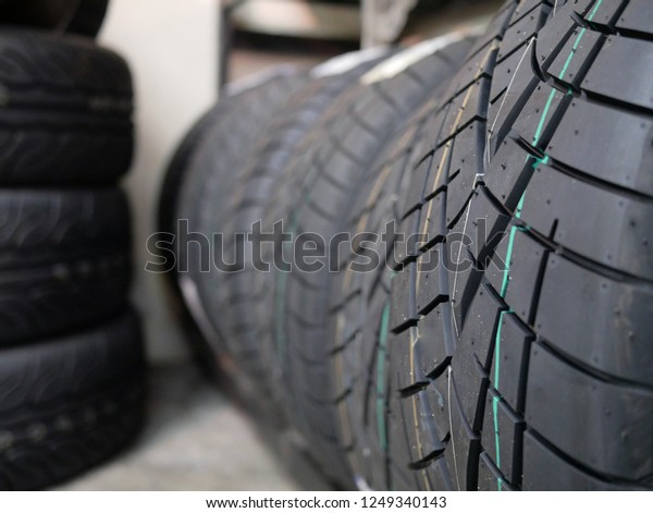 closeup of car\
tires texture at the tyre shop.\
