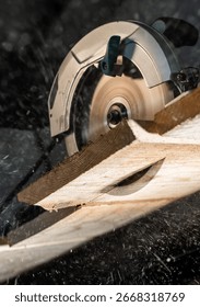 Close-up of a carpenter using a circular saw to cut a large board of wood 