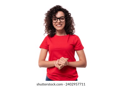 close-up of a caucasian young pretty curly brunette woman in a red t-shirt