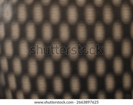 A close-up of a ceramic tile pattern featuring vertical lines and a creamy brown dot pattern. This geometric design is perfect for modern interior walls, bathrooms, or minimalist kitchens.