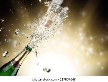 Close-up of champagne explosion