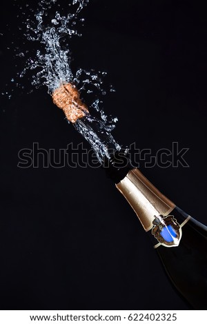 Close-up of champagne explosion
