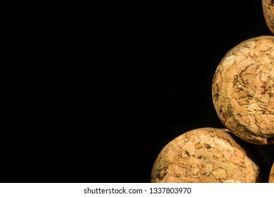 Closeup Of Champange Cork Isolated On A Black Background