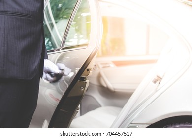 Closeup Of Chauffeur Opening Car Door