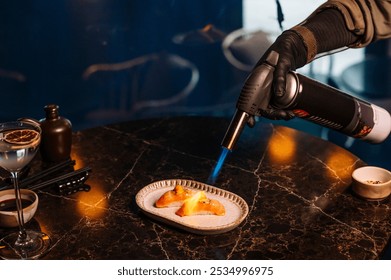 Close-up of a chef carefully searing a nigiri sushi with a culinary blowtorch. - Powered by Shutterstock