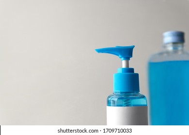 Closeup Chemical Blue Isopropyl Alcohol (Ethanol Or Ethyl Alcohol) Liquid In A Plastic Press Pump Head Blue Bottle With Blank Label For Medical And Prevent From Germs, Bacterial,coronavirus COVID-19.