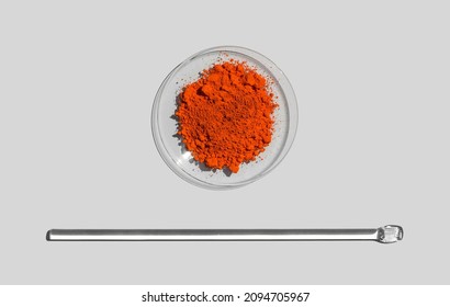 Closeup Chemical Ingredient On White Laboratory Table. Lead(II,IV) Oxide In Chemical Watch Glass Place Next To Stirring Rod. Top View